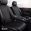 Black breathable Nappa leather seat covers installed in a car interior, showing the texture and stitching.