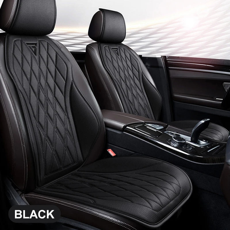 Black breathable Nappa leather seat covers installed in a car interior, showing the texture and stitching.