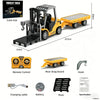 A yellow 1:64 scale forklift truck model with a black cargo platform and accessories like a remote control, battery, and char