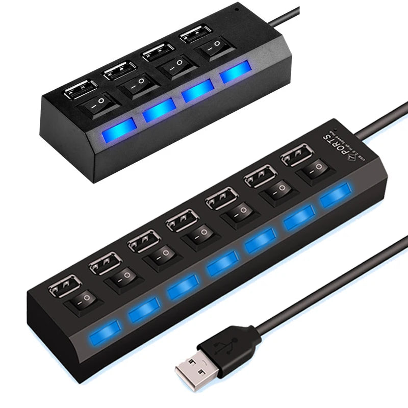 A black USB 2.0 multi-port hub with LED switches and a cable connector is shown from above.