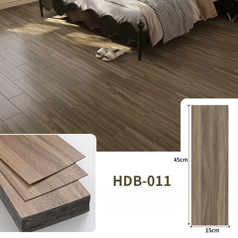 Close-up view of brown wood grain floor tiles installed in a room, showing texture and installation detail.