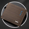 A brown striped leather wallet with stitching and a silver card holder is shown against a dark background.