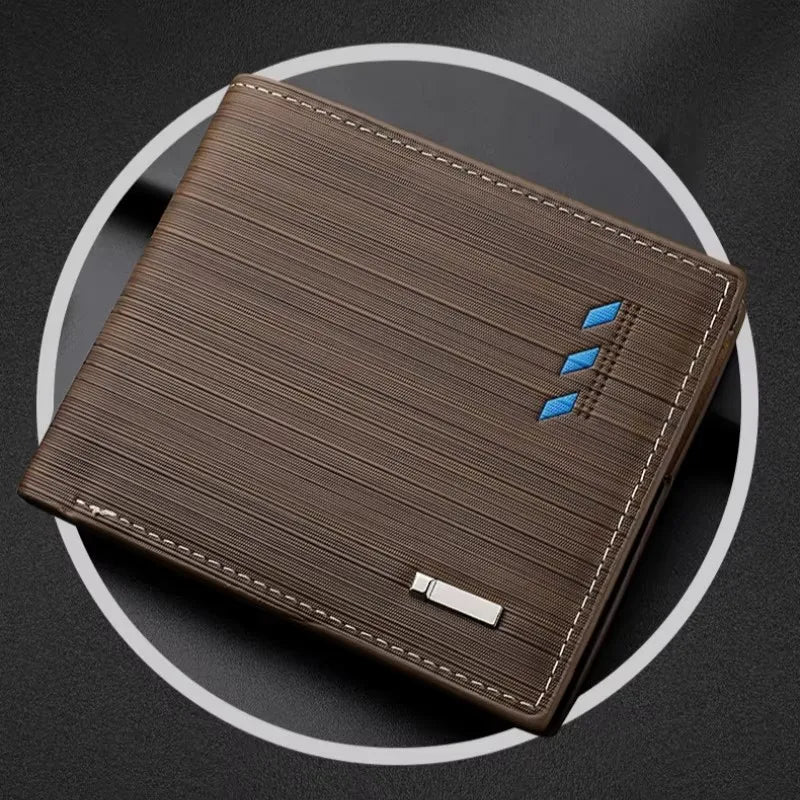 A brown striped leather wallet with stitching and a silver card holder is shown against a dark background.