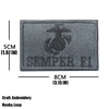 A gray embroidered tactical patch featuring an eagle design and the text SEMPER FI