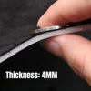 A hand is holding a thin piece of suede car headliner fabric with foam backing, showing its 4mm thickness.