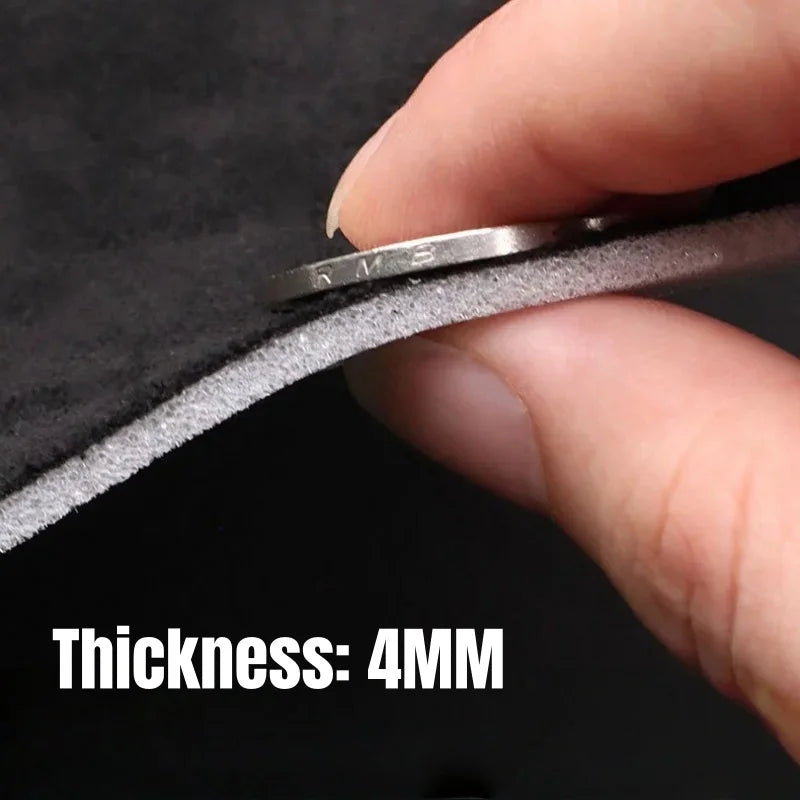 A hand is holding a thin piece of suede car headliner fabric with foam backing, showing its 4mm thickness.