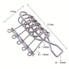 A set of metal wire puzzle brain teasers with various diameters and lengths.