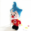 A soft plush toy of a blue-haired clown with a red nose and heart on the chest.