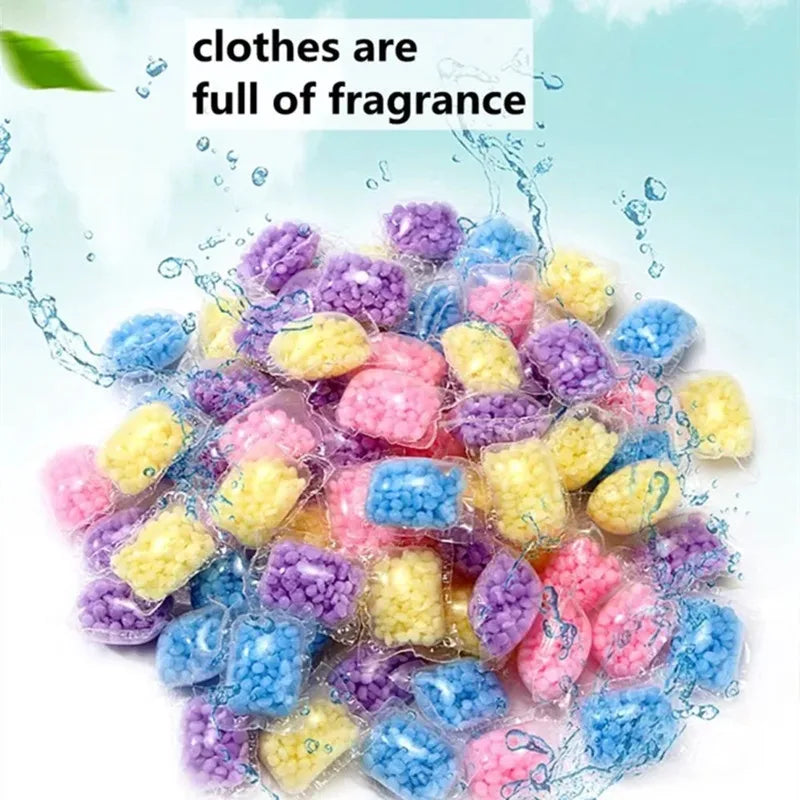 A pile of colorful water-soluble laundry fragrance beads in various shades of purple, blue, and yellow.