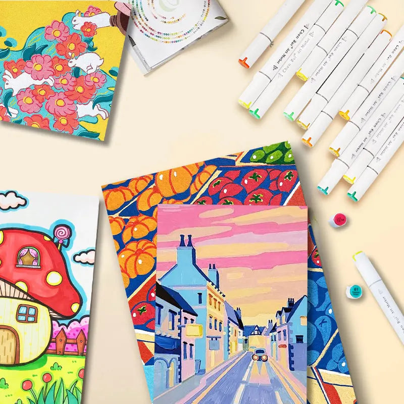 A collection of colorful alcohol markers and art supplies laid out on a light background.