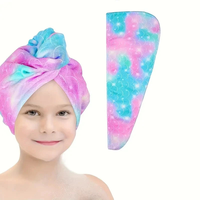 A pink and blue microfiber hair drying towel wrap is shown next to a smiling child's face.