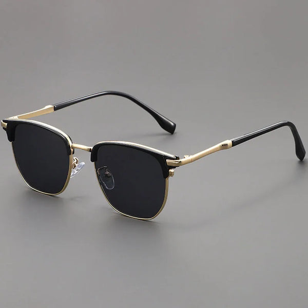 Vintage square sunglasses with black lenses and gold-toned metal frames