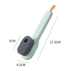 A light green shoe washing machine bag with a white handle and a grey soft bristled cleaning brush set.