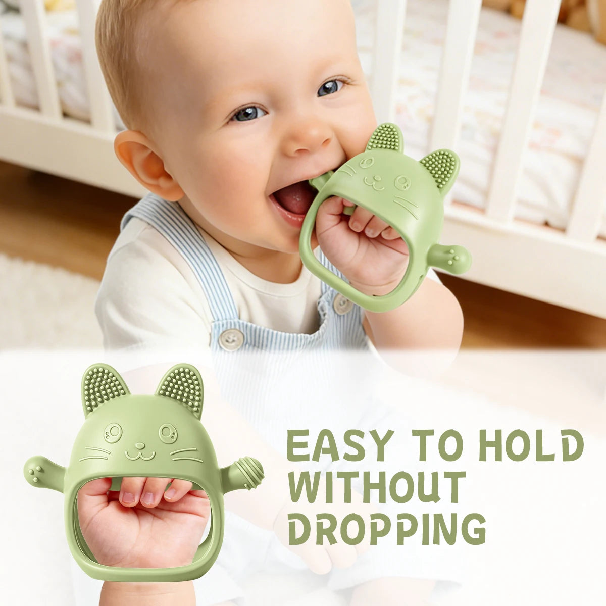 A baby is holding a green silicone cat teether designed to relieve gum discomfort.