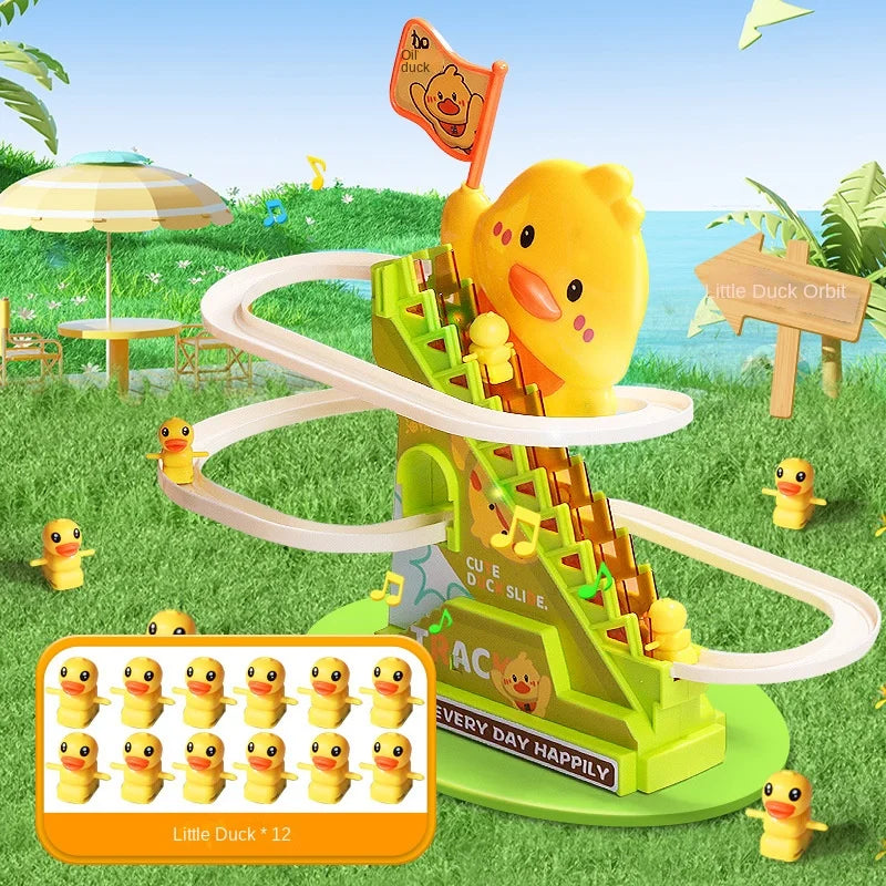 A yellow duck toy climbing a green plastic stair structure outdoors on grass.