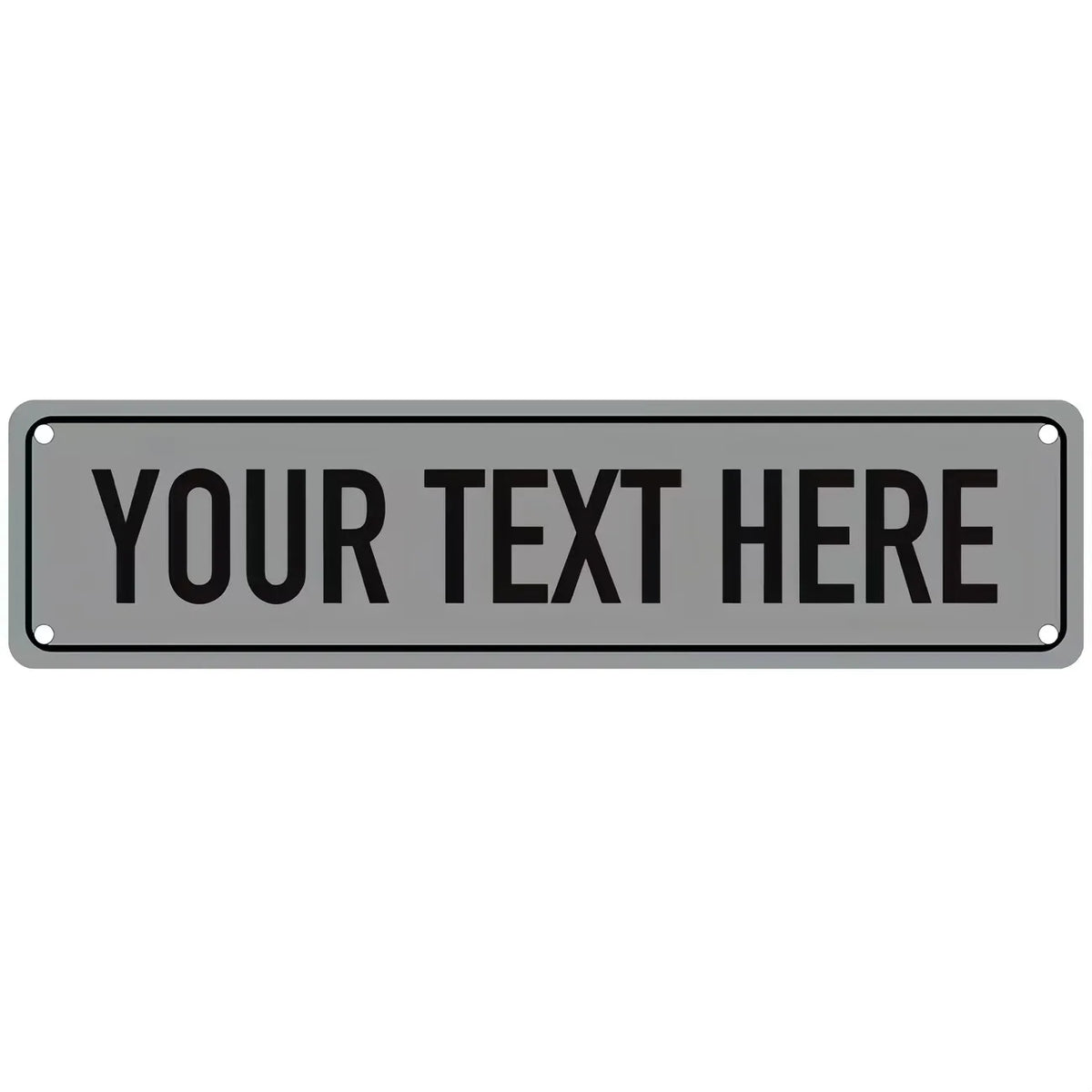 A rectangular gray metal sign with the text YOUR TEXT HERE engraved on it.