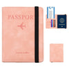 A pink leather passport wallet with a black strap and an accompanying card holder.