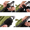 Hands demonstrate the use of rotatable PU leather stroller hooks for organizing bags on strollers and prams.