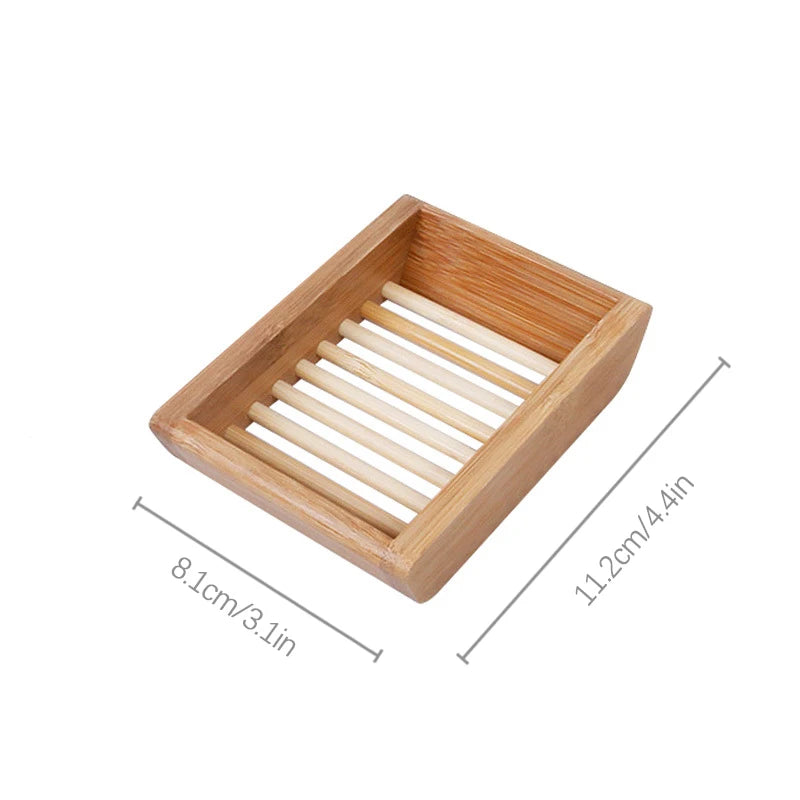 A wooden soap dish made of bamboo with multiple slots for fast-drying drainage.