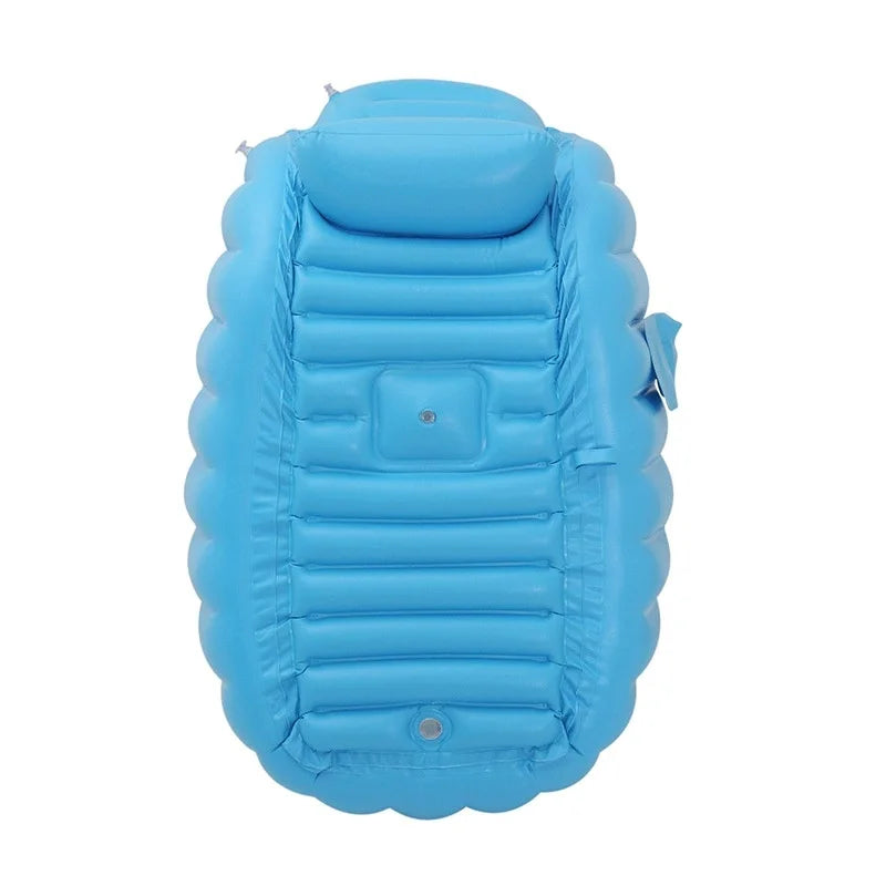 A light blue inflatable bathtub for babies and toddlers with a hand pump.