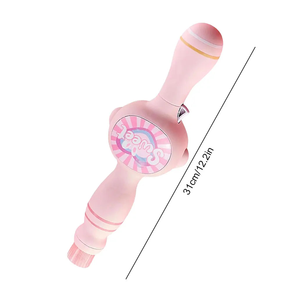 A pink magic smoke bubble machine with a light pink handle and a colorful light effect.