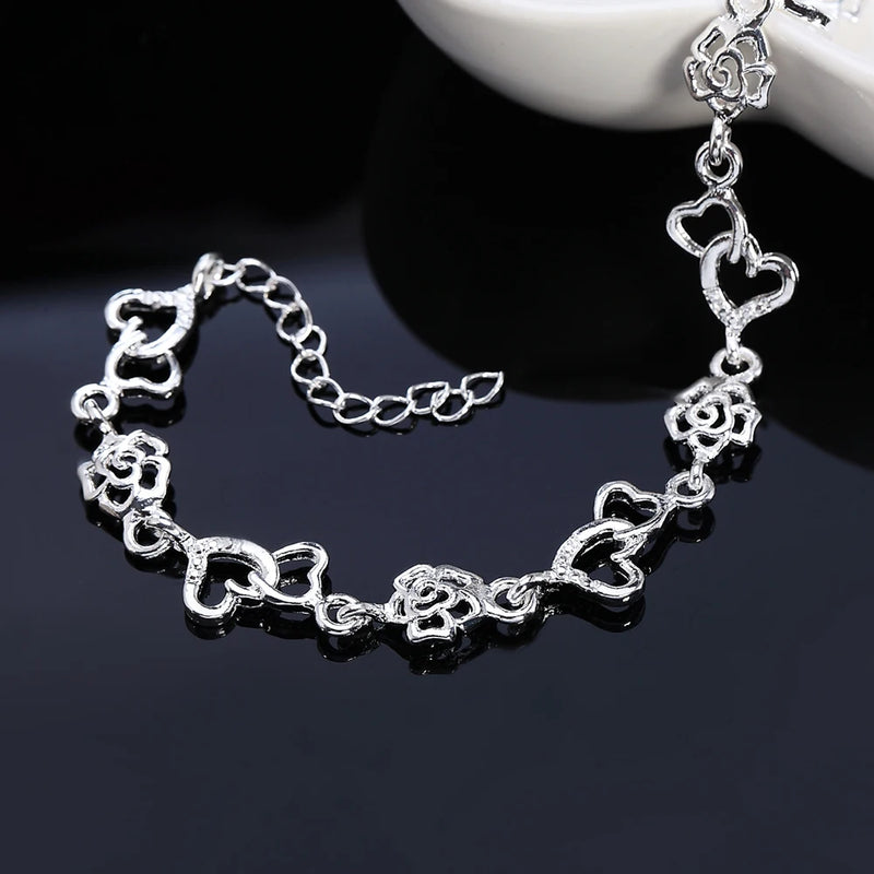 Pulsera de Cadena Corazón y Flor en Plata de Ley