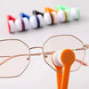 A set of colorful microfiber cleaning tools for glasses, including a round cleaning pad and a cleaning stick.