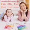 A child and a woman smiling while engaging in parent-child time, with rainbow polymer clay bead kits displayed on the table.