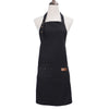 Black durable canvas kitchen apron displayed on a mannequin.