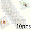 A clear plastic organizer bag containing ten small medical items like bandages and gauze pads.