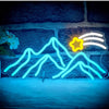 Blue neon sign depicting a mountain landscape with a star and stripes design.