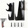 A pair of black heavy-duty floor jack stands with wall mount racks and various sized metal and plastic feet.