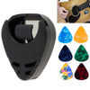 Black adhesive guitar pick holder with a slot for holding celluloid picks and a set of colored picks.