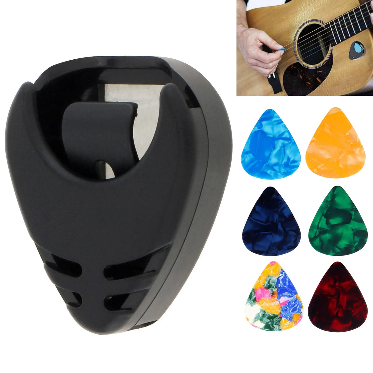 Black adhesive guitar pick holder with a slot for holding celluloid picks and a set of colored picks.