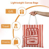 A red and white striped canvas tote bag featuring a graphic print of sardines in olive oil.
