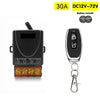 Black DC relay switch with a connector and a silver remote control key fob.