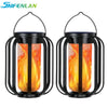 A pair of black solar flickering flame lanterns with glass inserts, designed for outdoor hanging light.