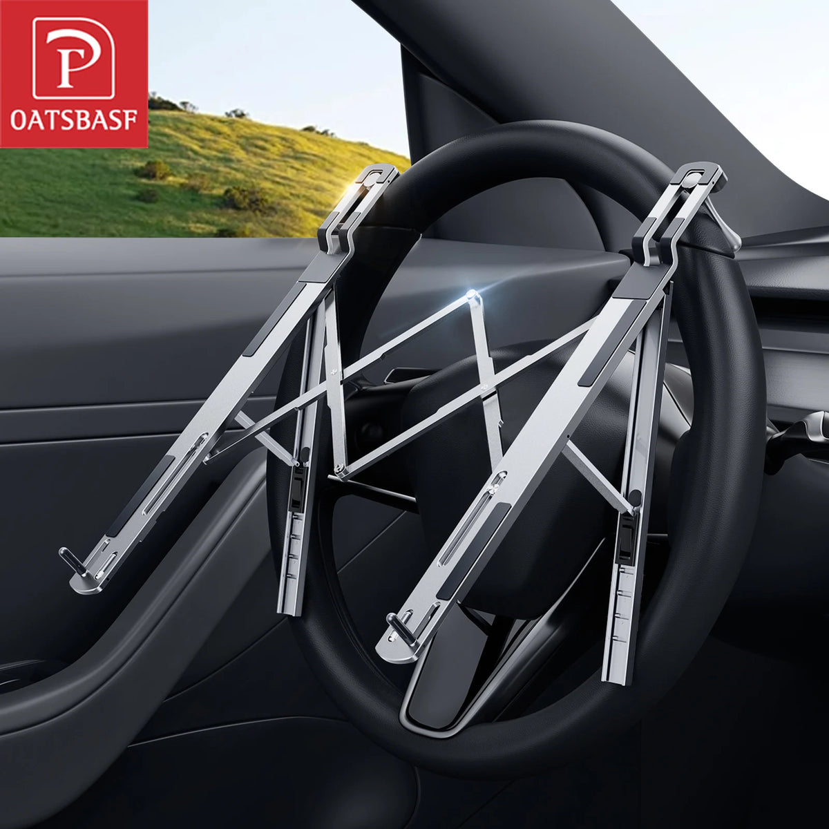 Foldable aluminum laptop stand for car steering wheel mounted on a vehicle interior.