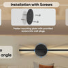 Installation guide showing how to attach a light fixture to a wall using screws and magnetic plates.