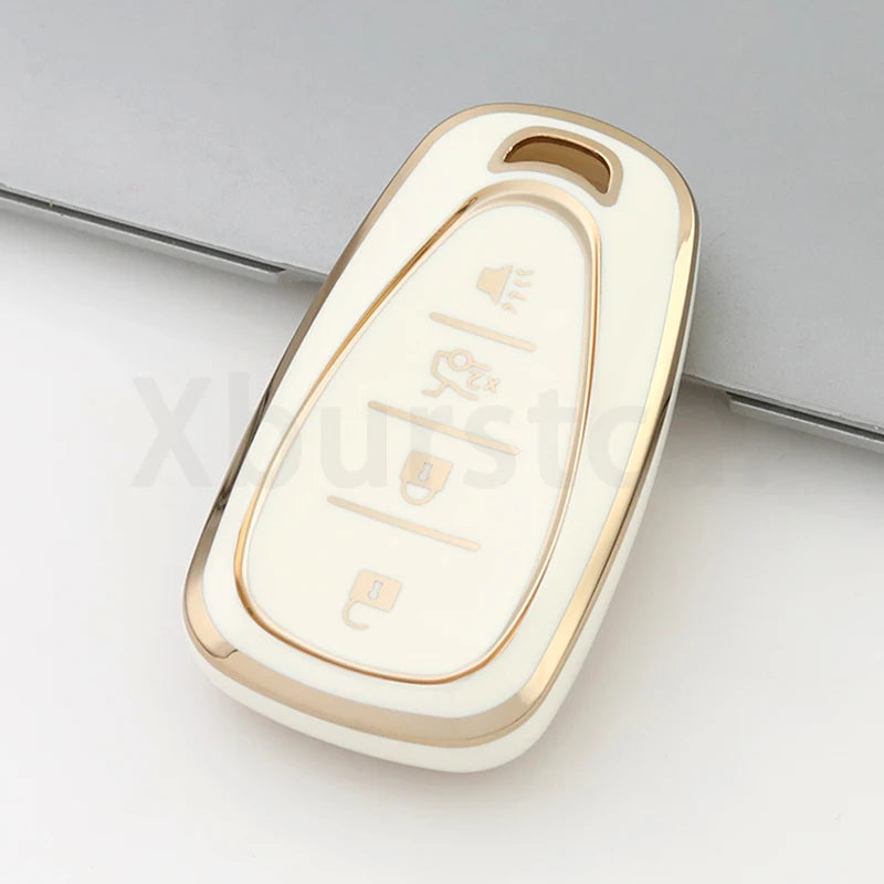 A white and gold durable TPU key fob cover for a Chevrolet vehicle.
