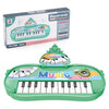 A green electronic music keyboard toy with a microphone and a box packaging.