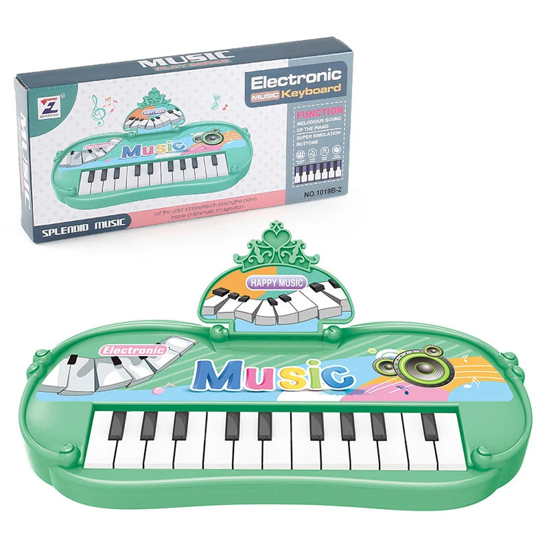 A green electronic music keyboard toy with a microphone and a box packaging.