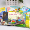 A stack of colorful picture books for early English learning and bedtime stories are displayed on a white surface.