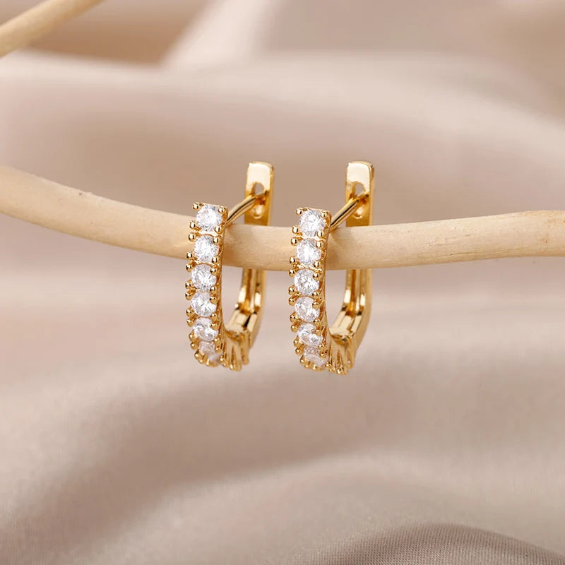 Boucles d'oreilles créoles en zircon cubique ton or