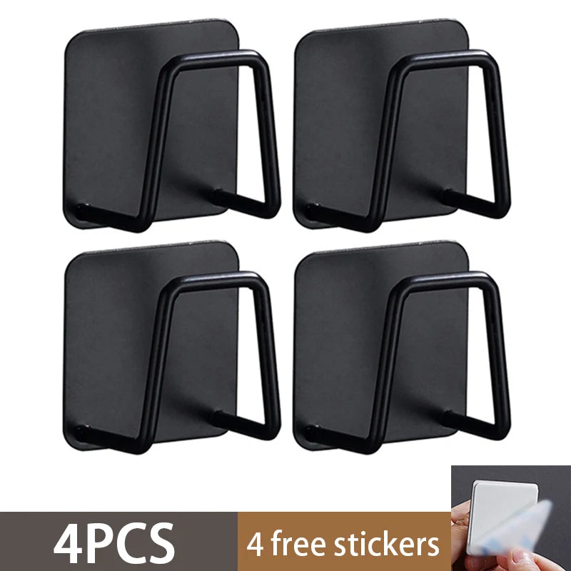 Four black stainless steel sponge holders or kitchen sink racks shown in various angles