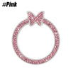 A silver ring with a pink butterfly design encrusted with sparkling rhinestones.