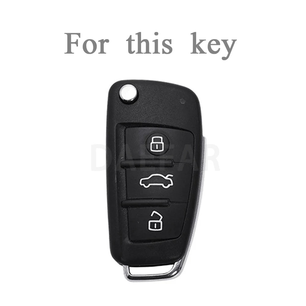 Black protective TPU key fob cover for an Audi flip key.