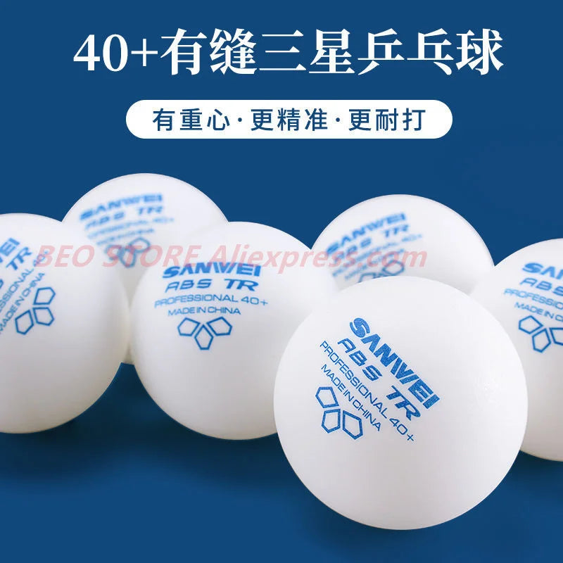A close-up view of several white table tennis balls with blue and red markings, emphasizing their professional quality.
