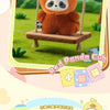 An adorable orange panda plush toy hanging in a wooden swing against a green outdoor background.