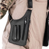 A black anti-theft underarm wallet bag with an adjustable strap is shown attached to a tan shirt.